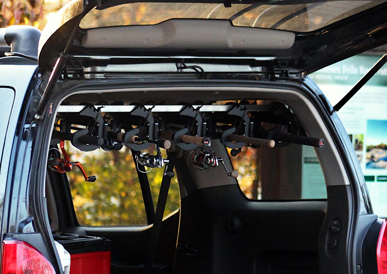 Rod Rig holding five fishing rods. In-vehicle fishing rod holder. Rod Rig in an SUV.